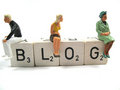 People sitting on scrabble letters